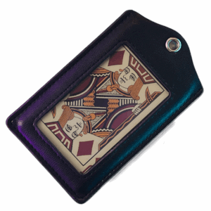 a leather tag with a piece of paper in it