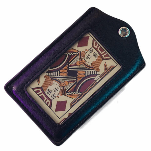a leather tag with a piece of paper in it